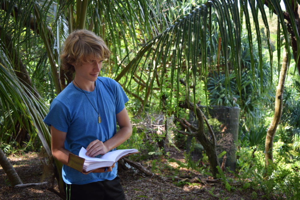 PYCC youth reads a poem he wrote about Merwin's palm planting