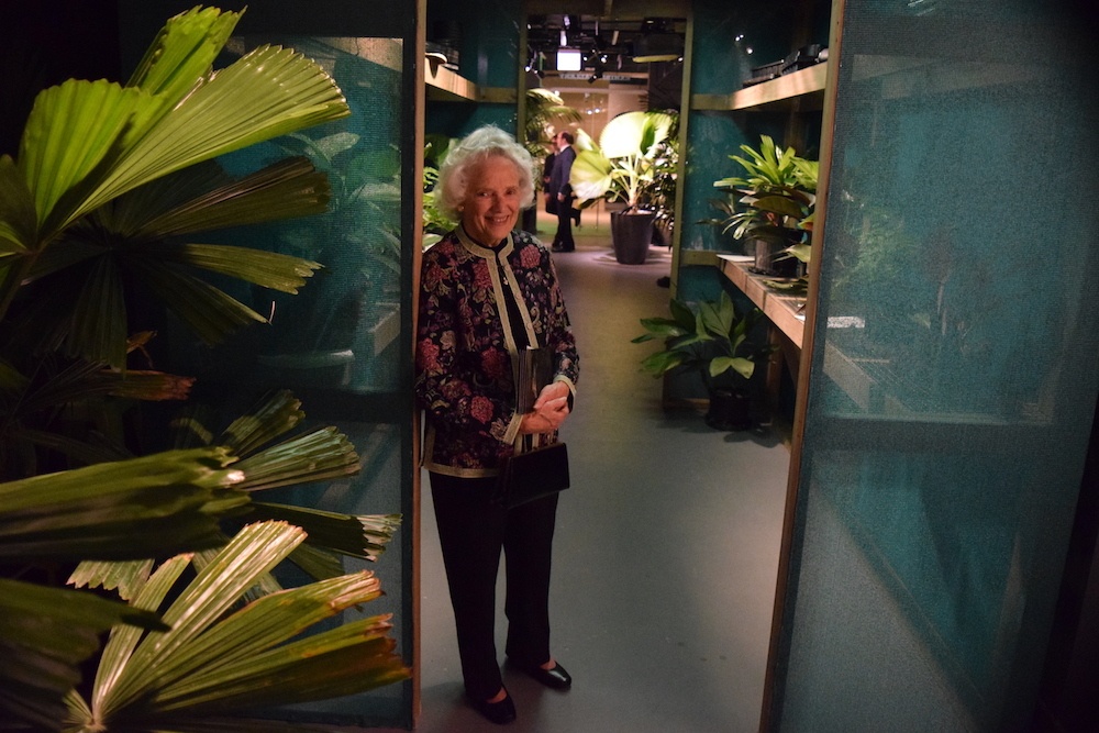 W.S. Merwin's sister Ruth Moser in the Palm exhibit's replica of his shade house